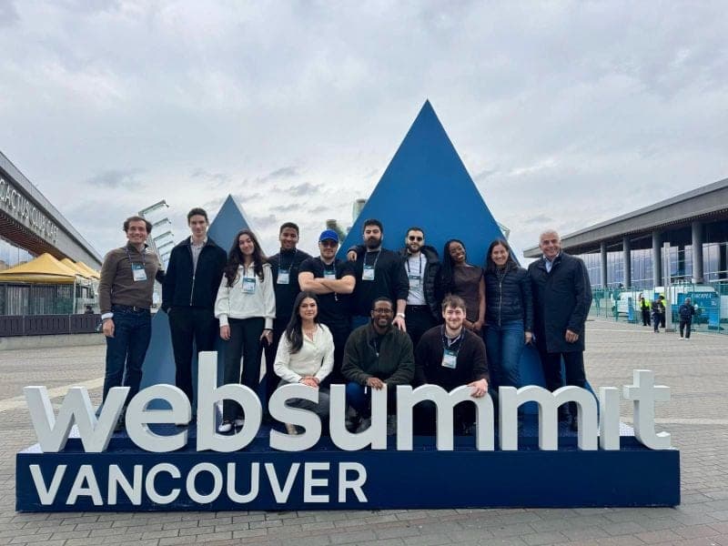 The Profyle Immune delegation in front of the Web Summit Vancouver sign